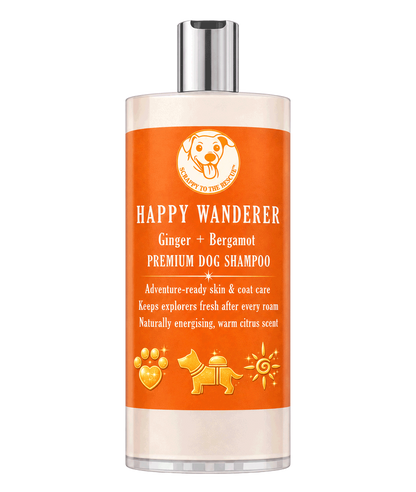 Happy Wanderer dog shampoo bottle with orange label on a white background